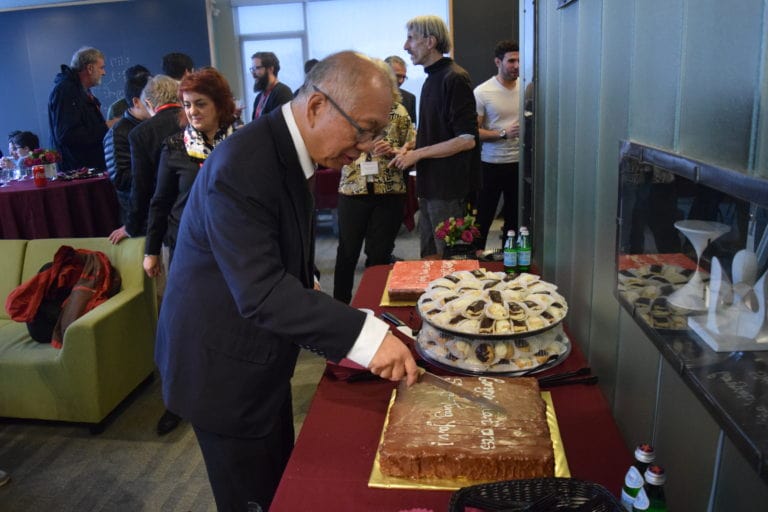 Shing-Tung Yau Cutting Cake in a Conference in Honor of His 70th Birthday