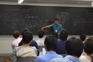 A Man in Blue T-shirt in the Workshop on Topology and Dynamics in Quantum Matter